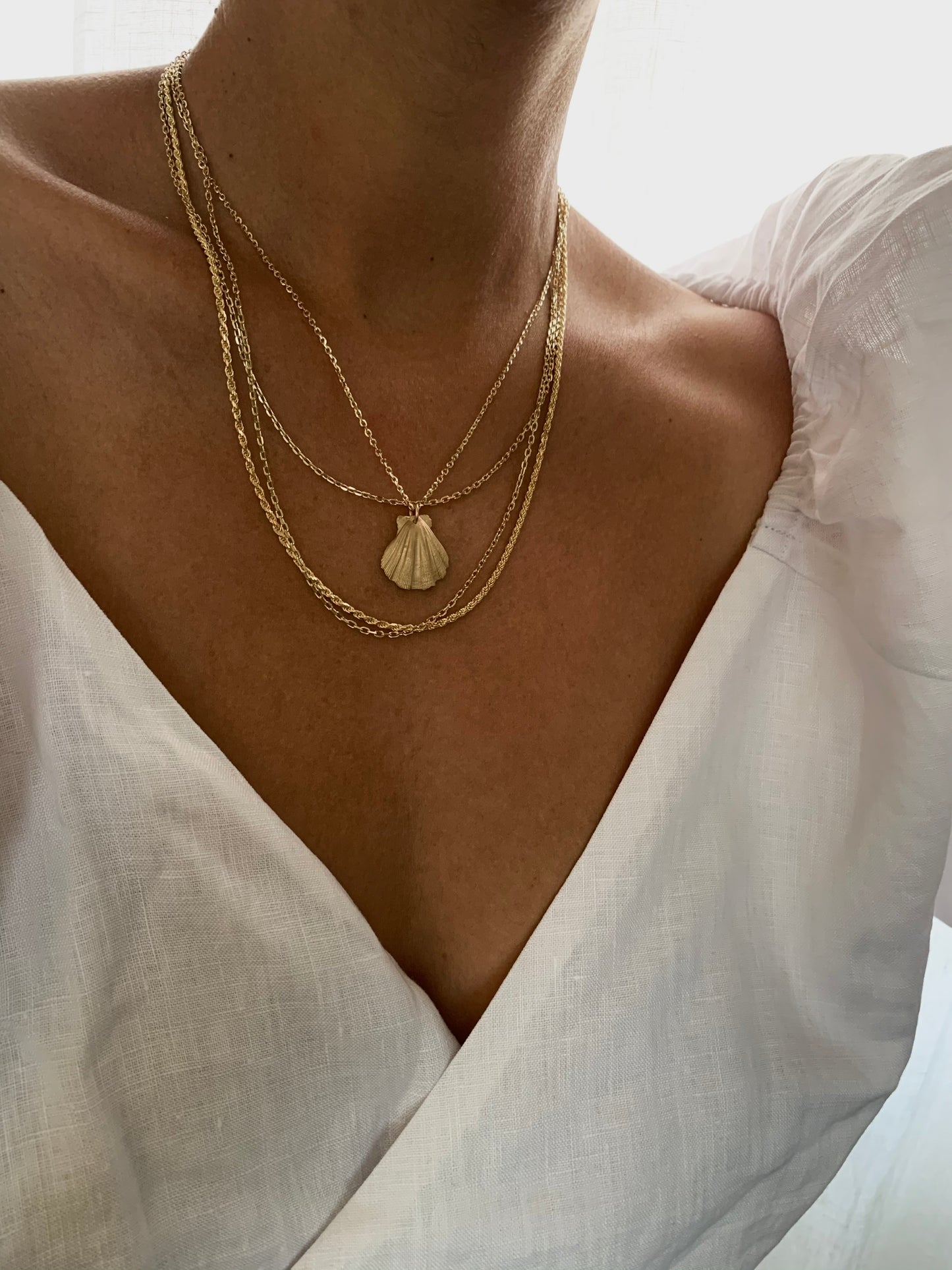 Kai seashell gold