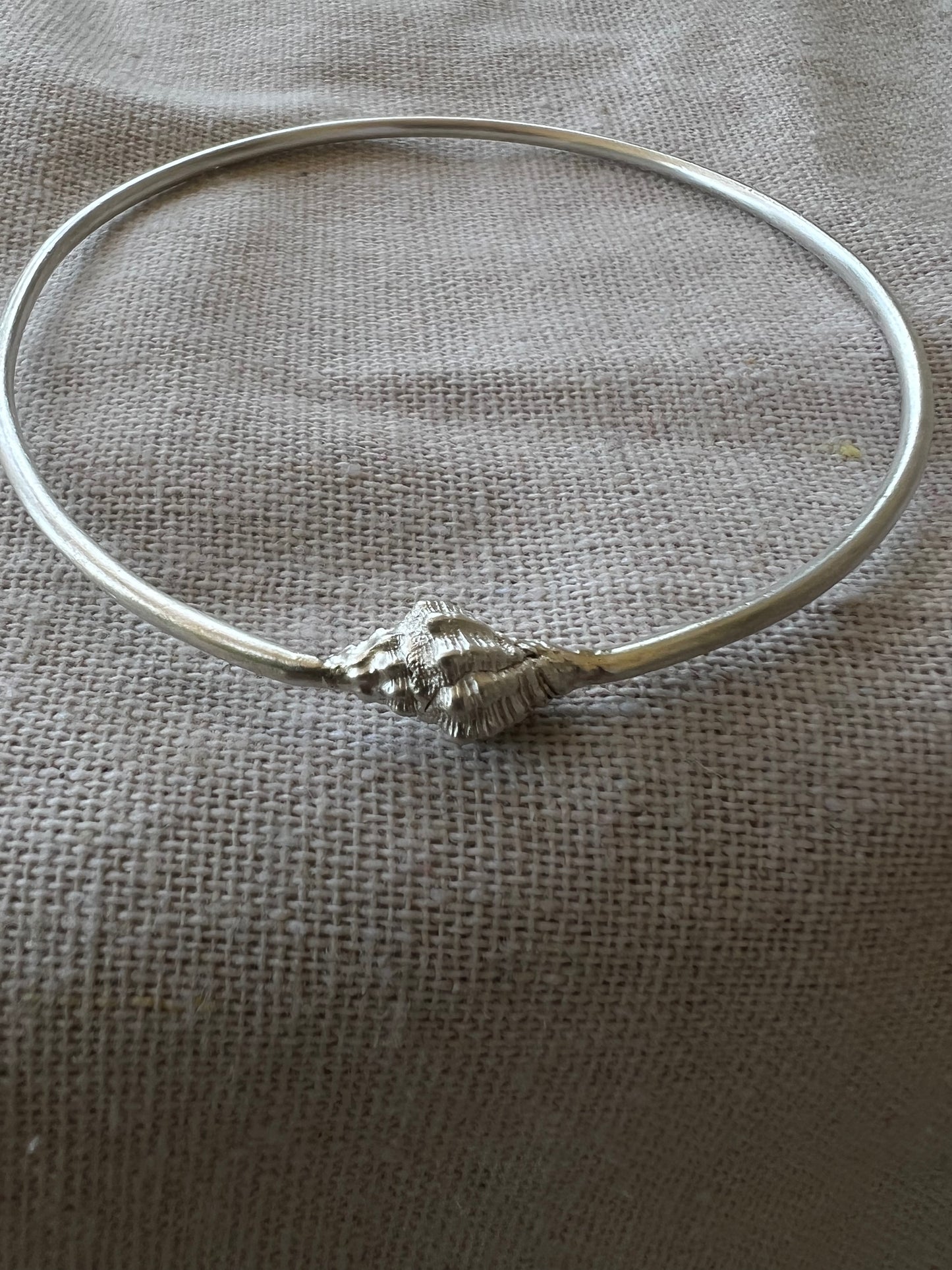 poseidon silver bangle